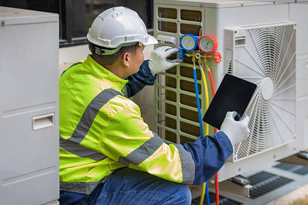 Professional Heat Pump Repair technician working in Emerson, NJ
